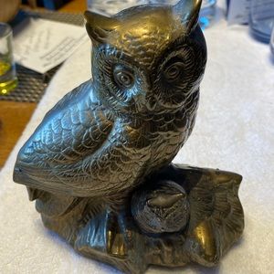 Vintage Owl and baby. 7 inches tall 3 inches wide on base. Weighs 2.6 pounds.